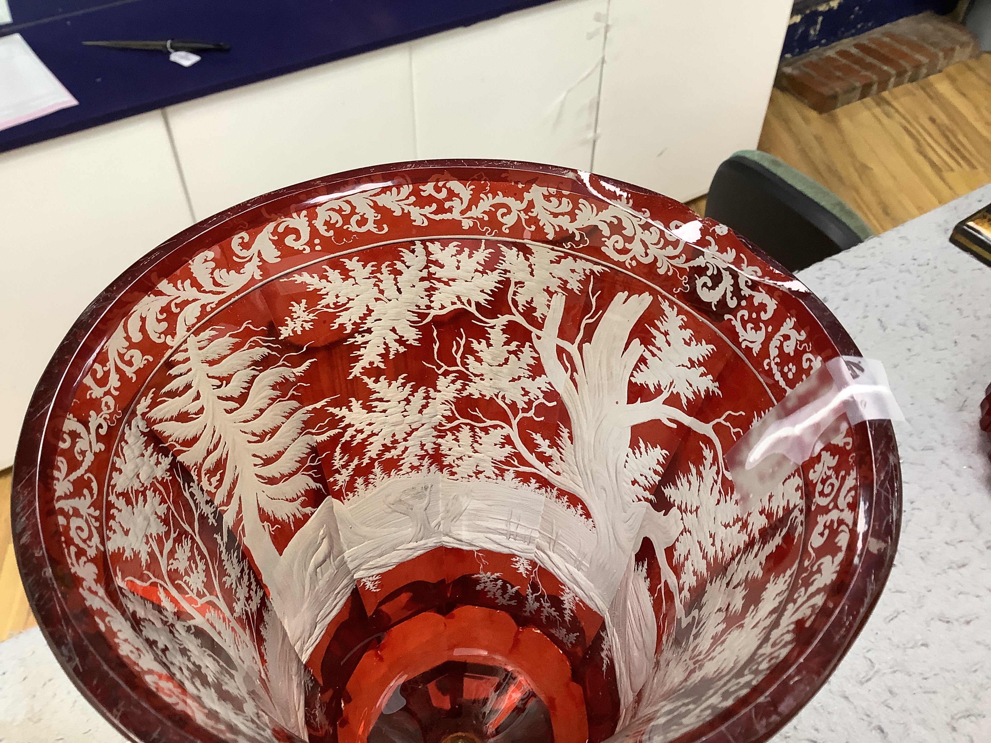 A late 19th century Bohemian ruby flashed and wheel engraved glass vase and cover, 52cm high and a Venetian enamelled glass vase